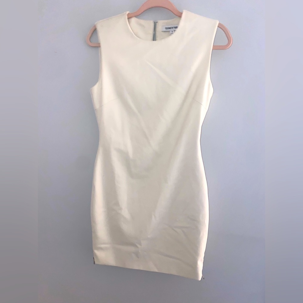 Elizabeth and James white mini dress with zipper slits on both sides